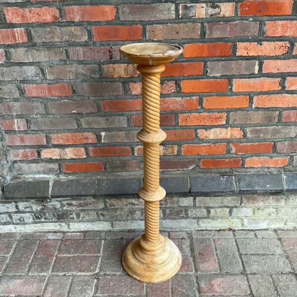 Antique light oak jardiniere stand with twist column design.