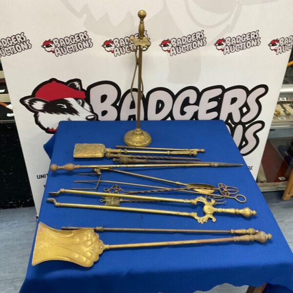 Quantity of brass fire place tools inc toasting forks and pokers