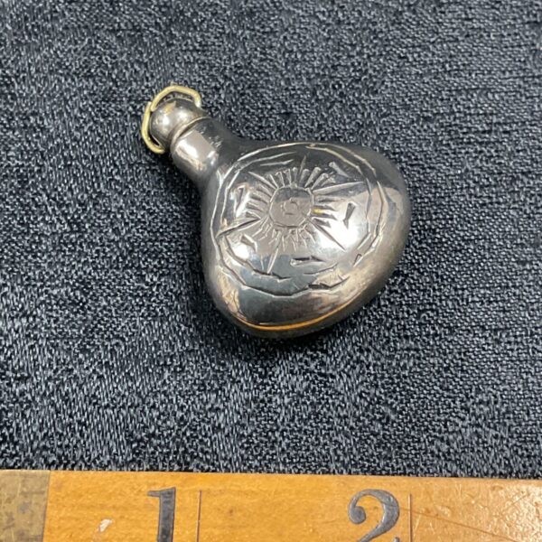 Small metal perfume bottle pendant