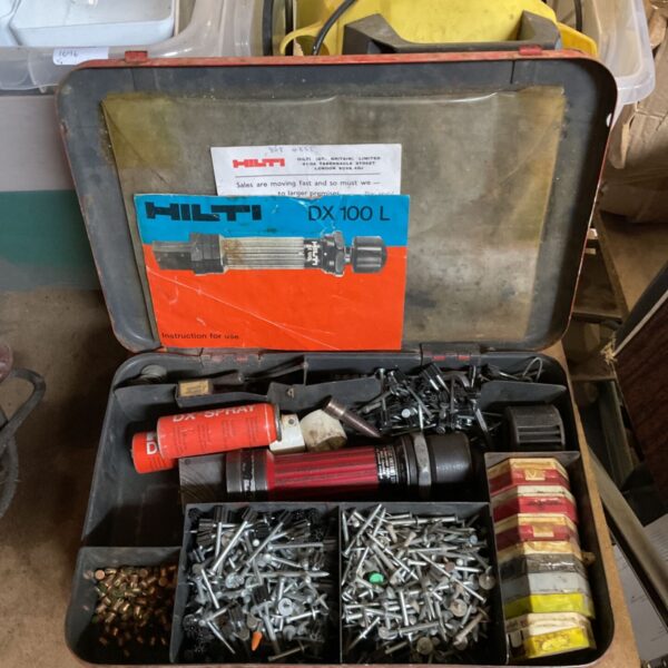 a Hilti DX 100 L powder-actuated fastening tool in case