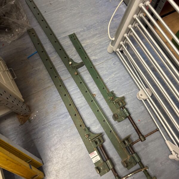 Three assorted size metal sash clamps