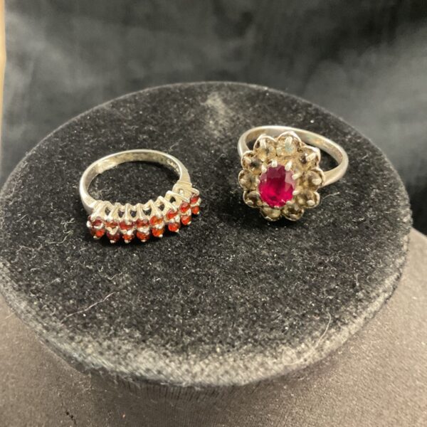 Two 925 Silver Rings set with red stones sizes N P 6.63g