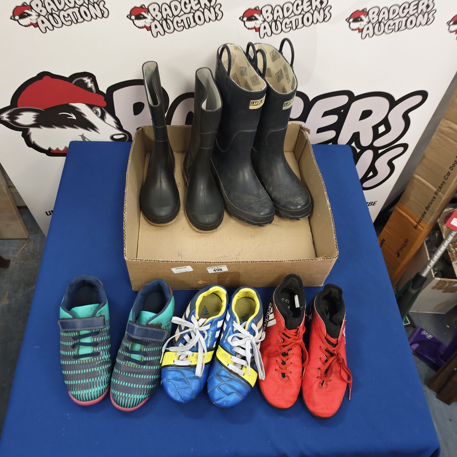 Two pairs of wellington bottoms Inc Lakeland size 1 & 6 with three pairs of footballs boots kids sizes 2 & 3 Inc Adidas