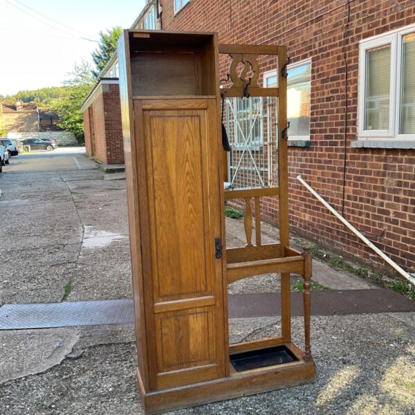 Vintage oak hall cabinet with mirror, coat hooks & stick stand