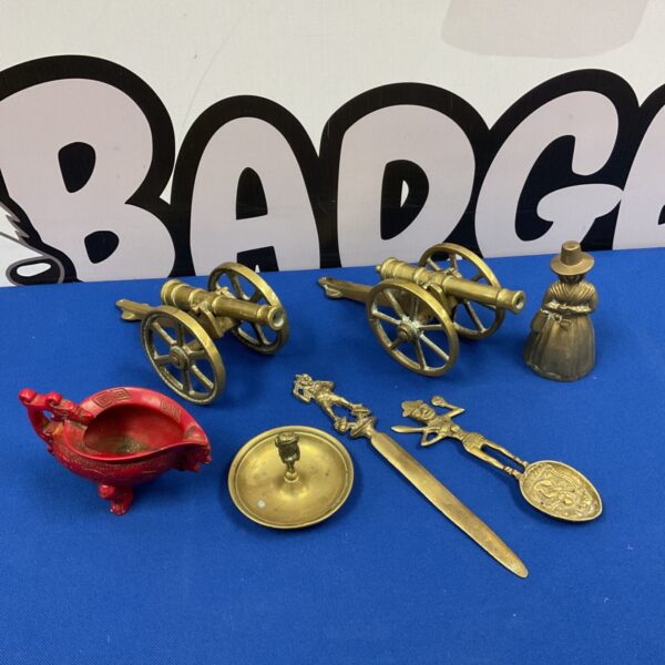 Two brass cannons, letter opener, bell & chinese cinnabar style tripod vessel