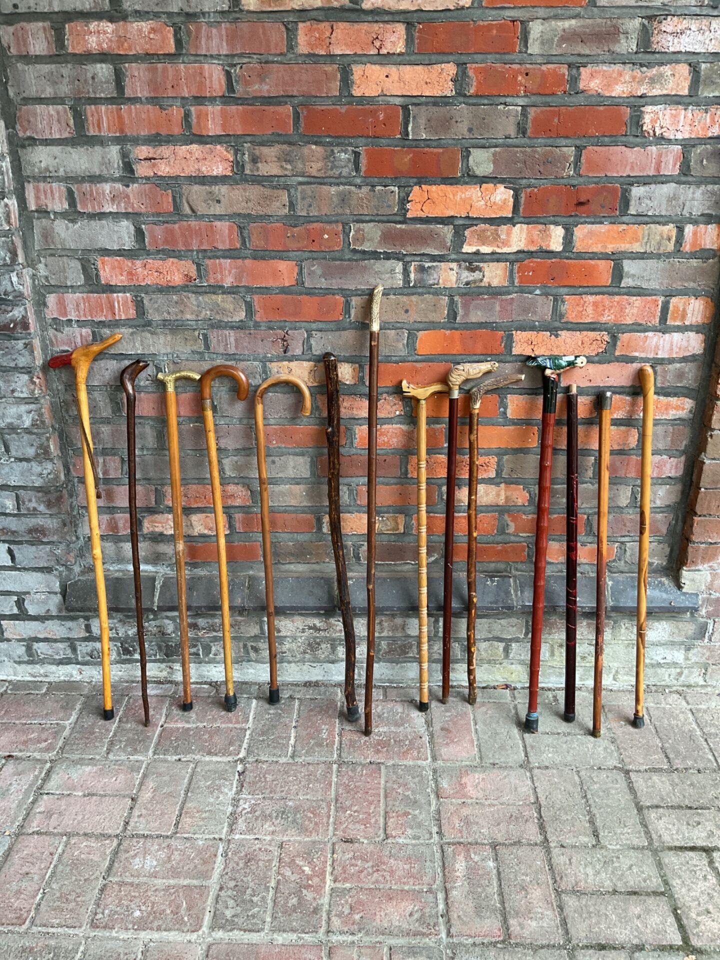 002 Collection of vintage walking sticks including horn handled & silver topped stick