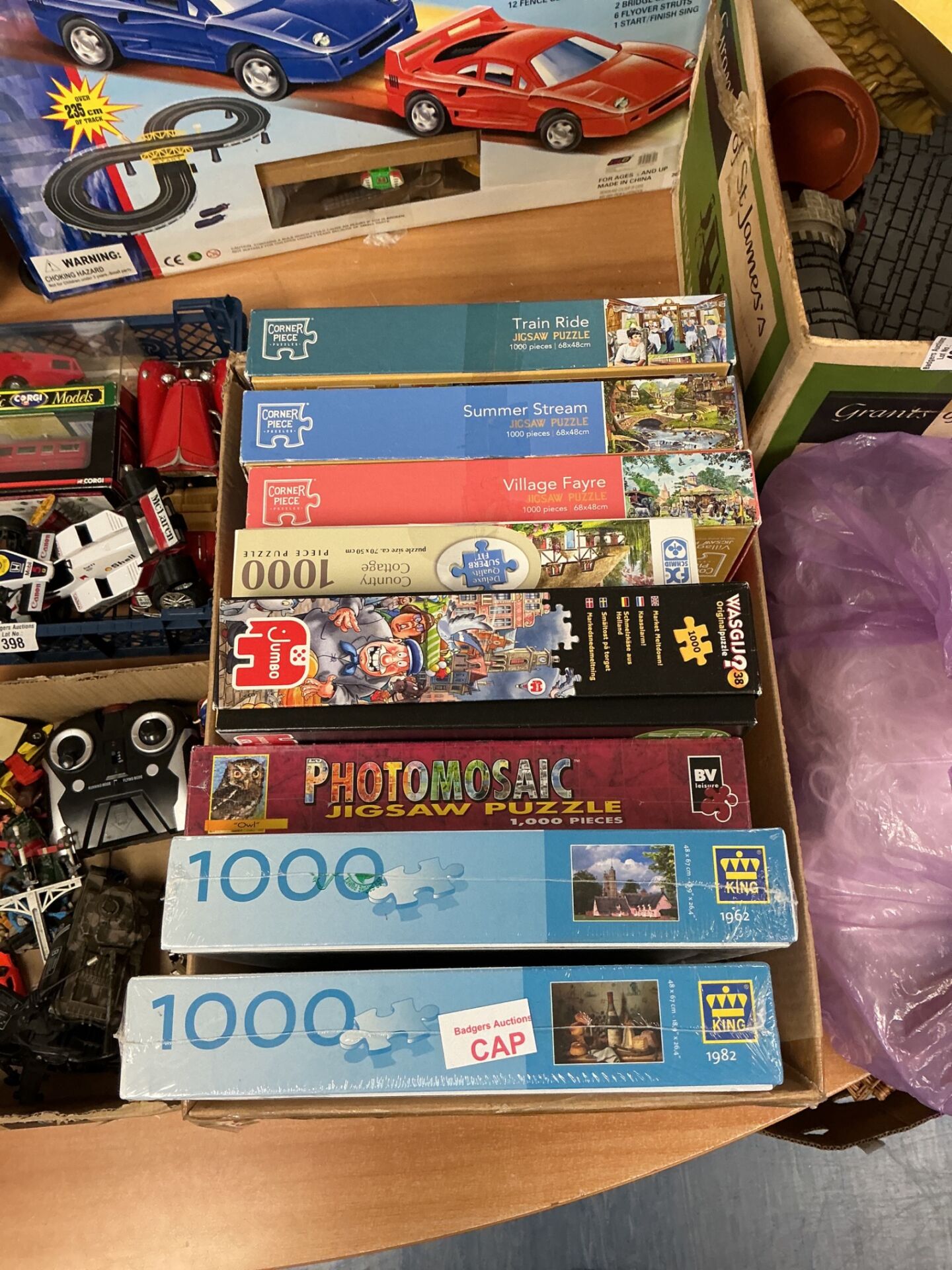 401 Box of puzzles including corner piece, some sealed
