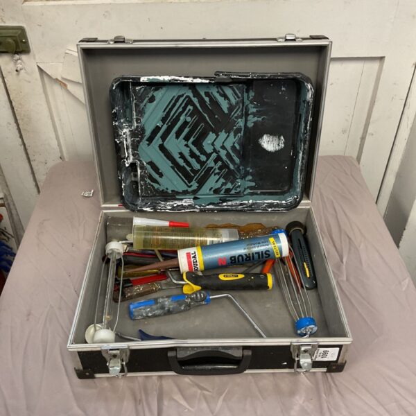 Flight case containing painting equipment
