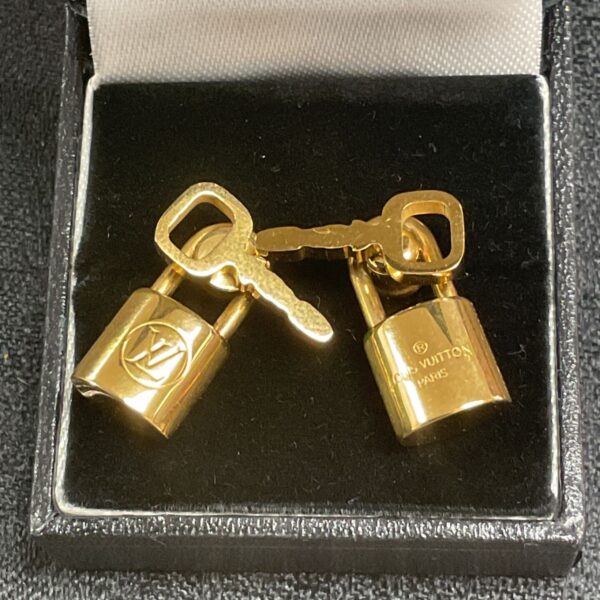 Vintage Louis Vuitton lock earrings, gold tone, designer jewellery.