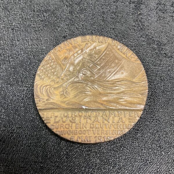 Antique Lusitania medal depicting a sinking ship, German propaganda.