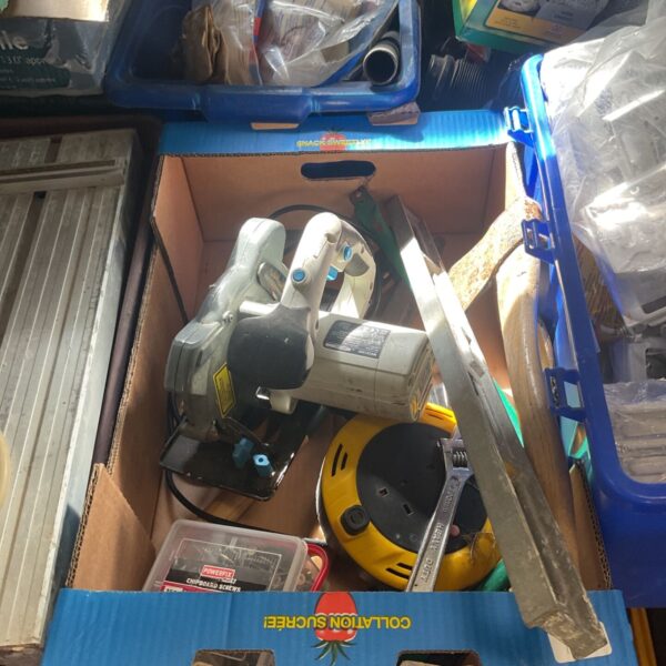 Mac Allister 1200W circular saw in a box with other tools.