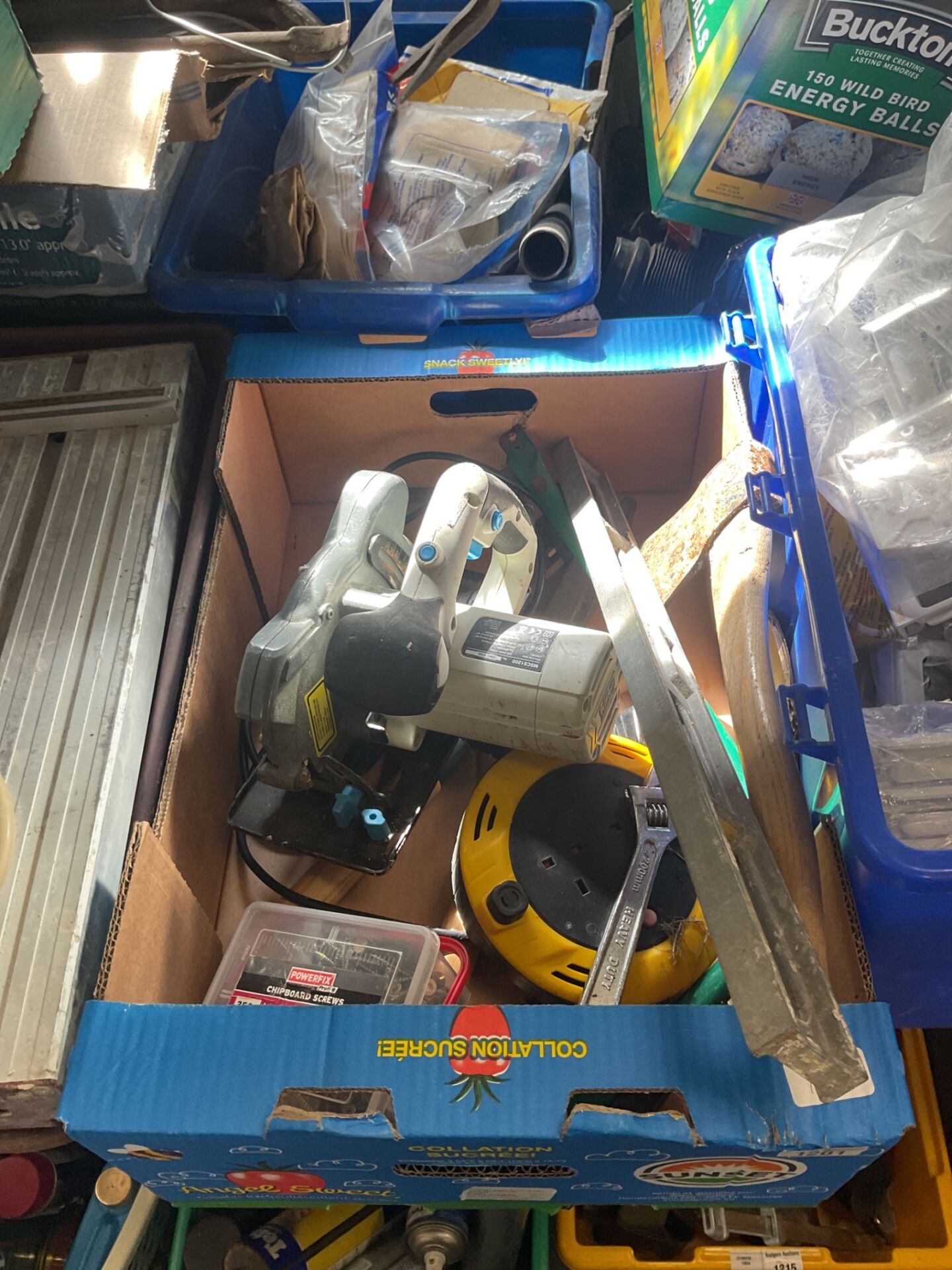 1201 Box containing items such as hachet, mac allister 1200w circular saw and extension reel