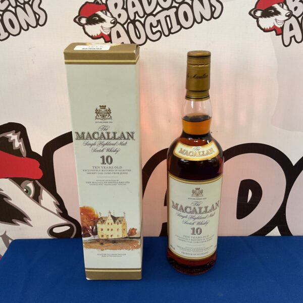 Sealed bottle of Macallan 10 year old single malt scotch whisky.