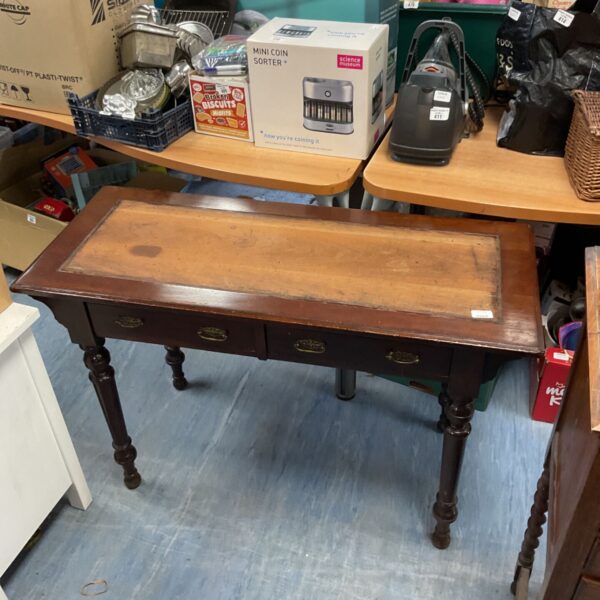 Antique mahogany hall table needing restoration, with two drawers.