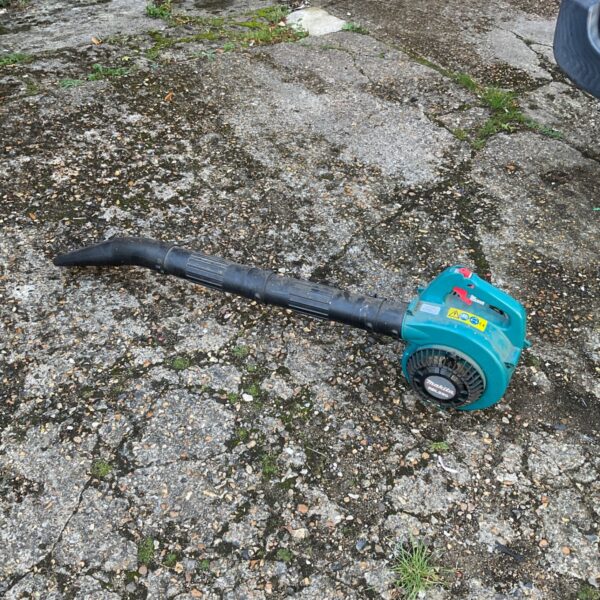 Used Makita RBL250 petrol leaf blower for garden clearing.