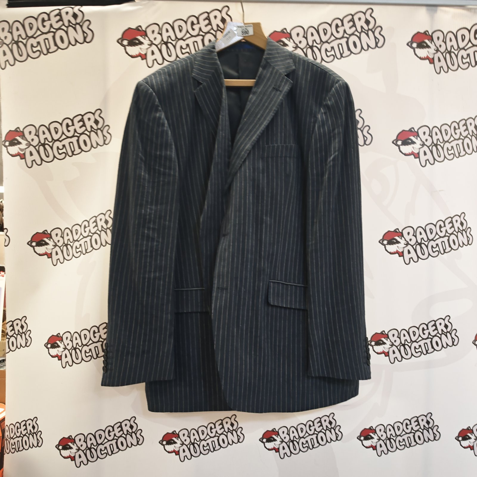 Navy blue pinstripe suit jacket by Marks & Spencer.