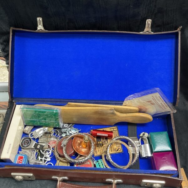 Vintage leather Masonic regalia case filled with various oddments and collectibles.