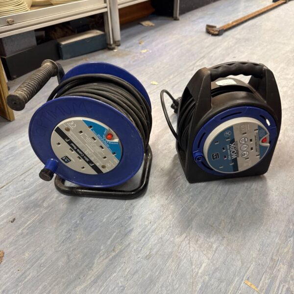 Blue Masterplug extension lead with cable reel for outdoor use.