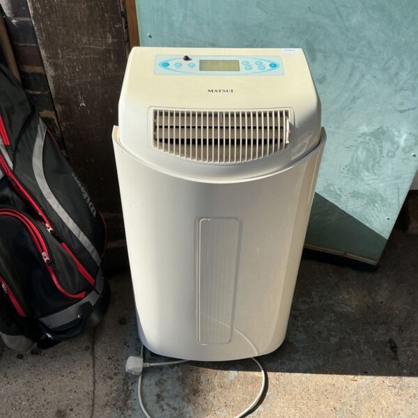 White Matsui mobile air conditioner unit for cooling a room.