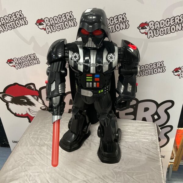 Mattel Darth Vader interactive toy figure with lightsaber.