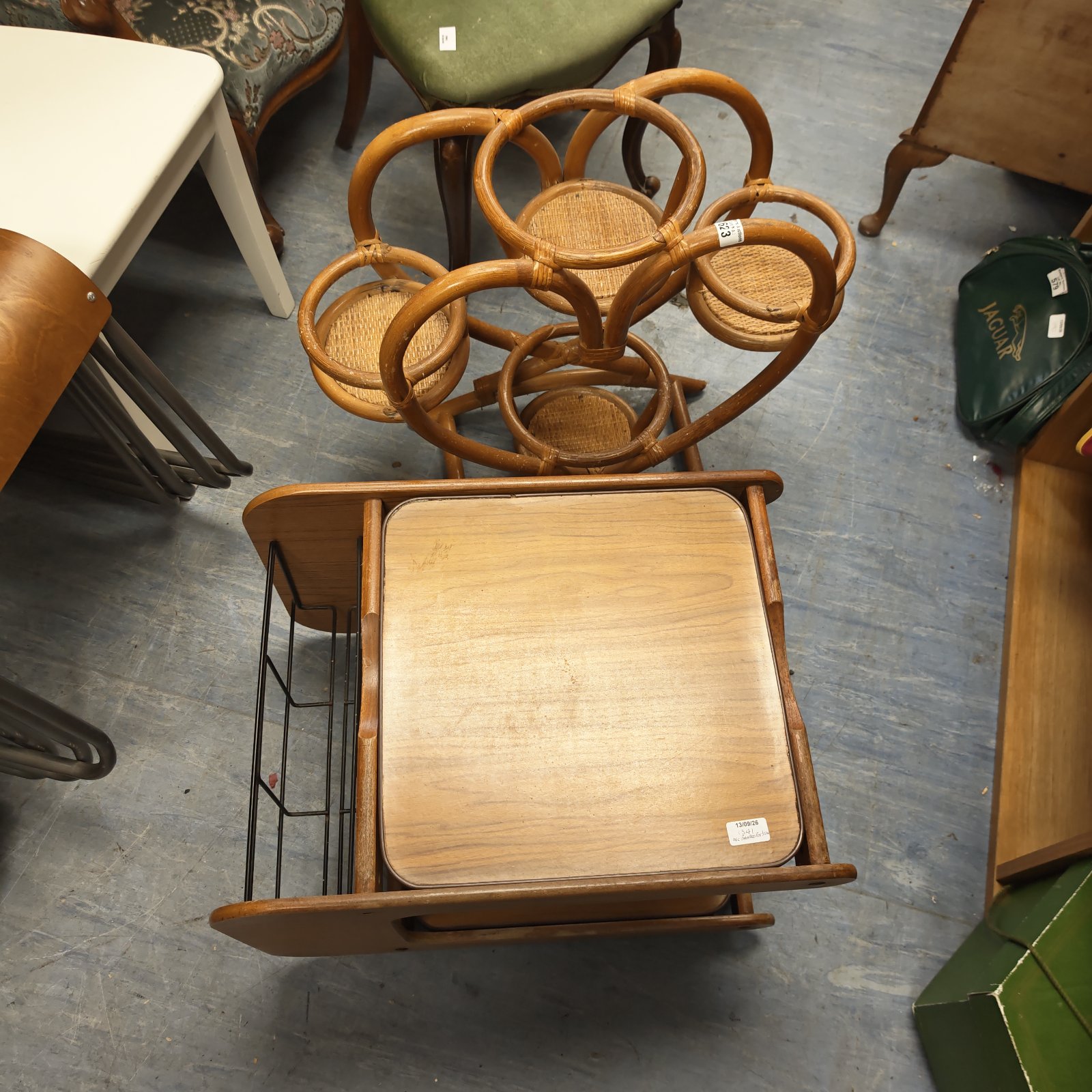 Mid-century modern magazine table with bamboo frame and Formica top.