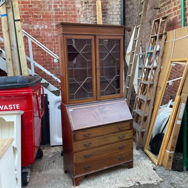 Vintage mid-century mahogany bureau with drop-down writing desk and display cabinet.