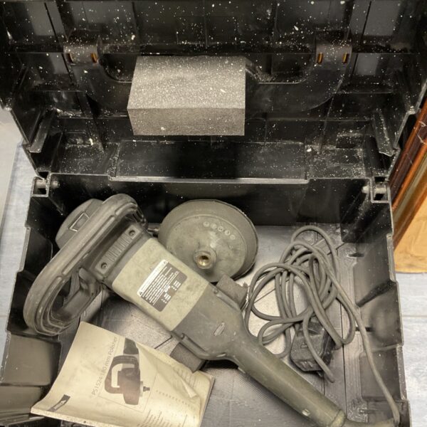 Mirka PS1524 polisher inside its original black carry case.