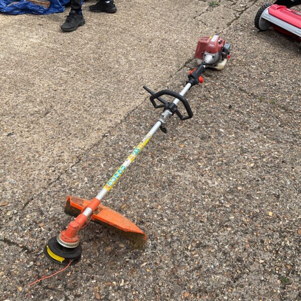 Used Mitox petrol strimmer for garden and lawn maintenance.