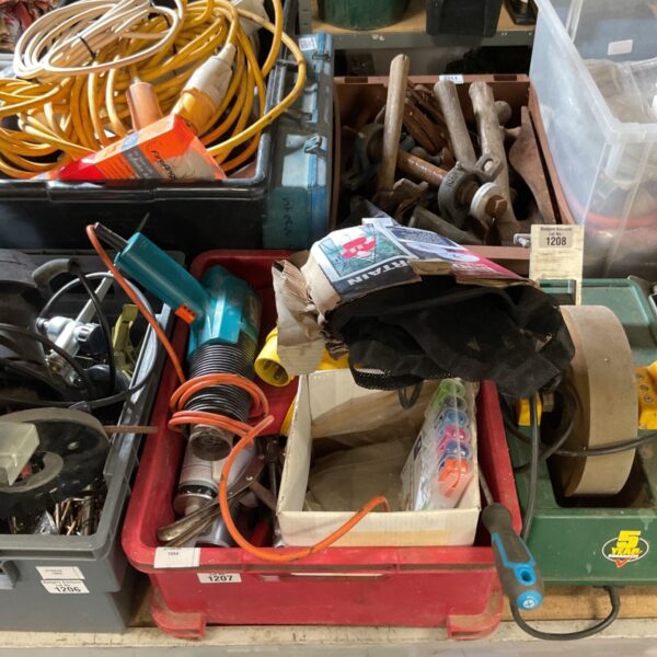 Mixed appliance lot with a visible heat gun and various tools.