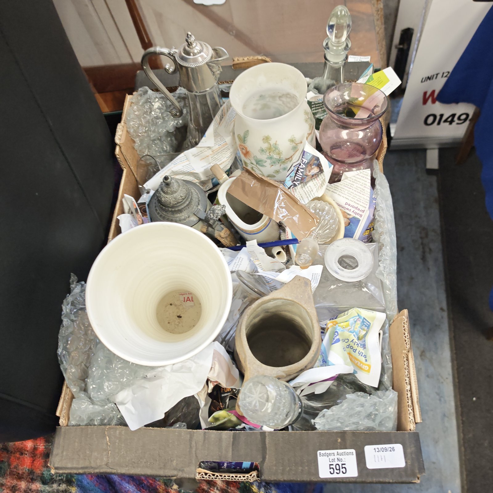 Mixed curios lot with vintage vases and tankards.
