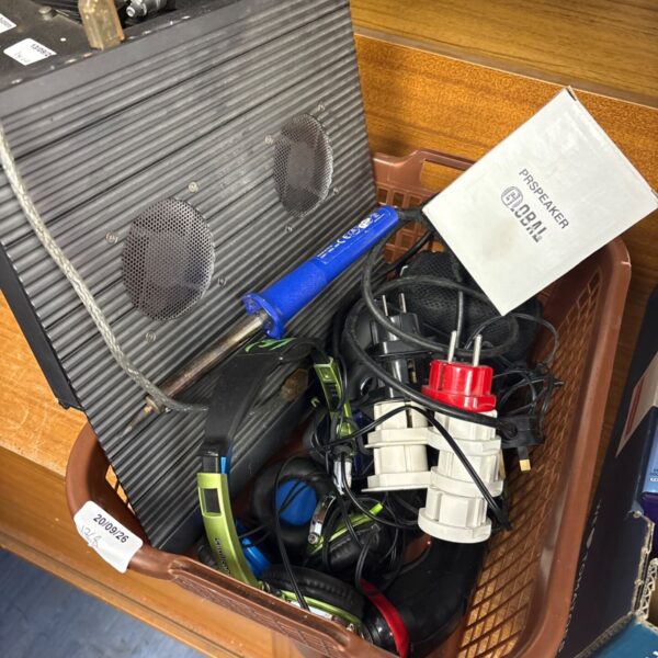 Mixed electronics lot with headphones, speaker, and cables.