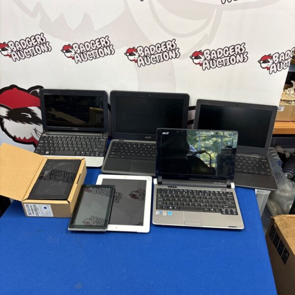 Mixed lot of tablets and laptops for repair or parts.