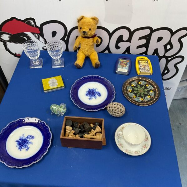 Mixed lot of vintage collectibles including a teddy bear and chess pieces.