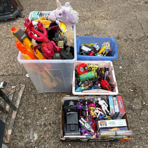 Mixed toy lot with action figures and diecast cars.