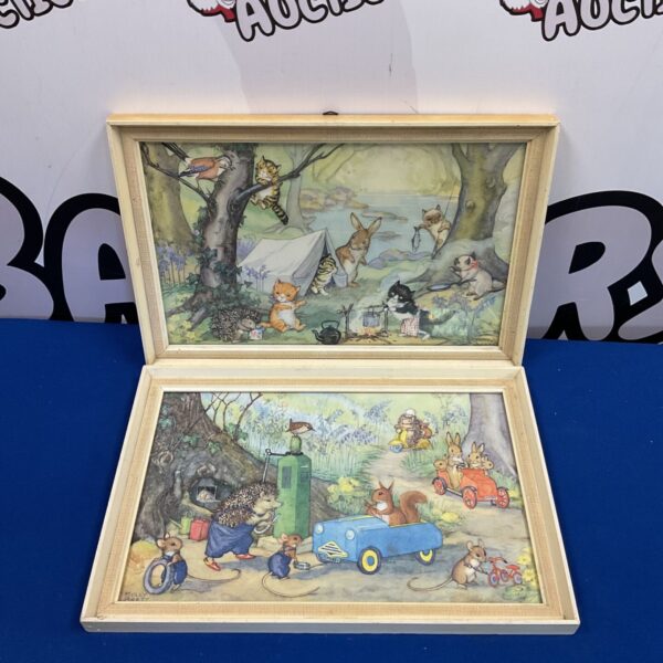 Vintage Molly Brett nursery prints featuring charming animal illustrations.