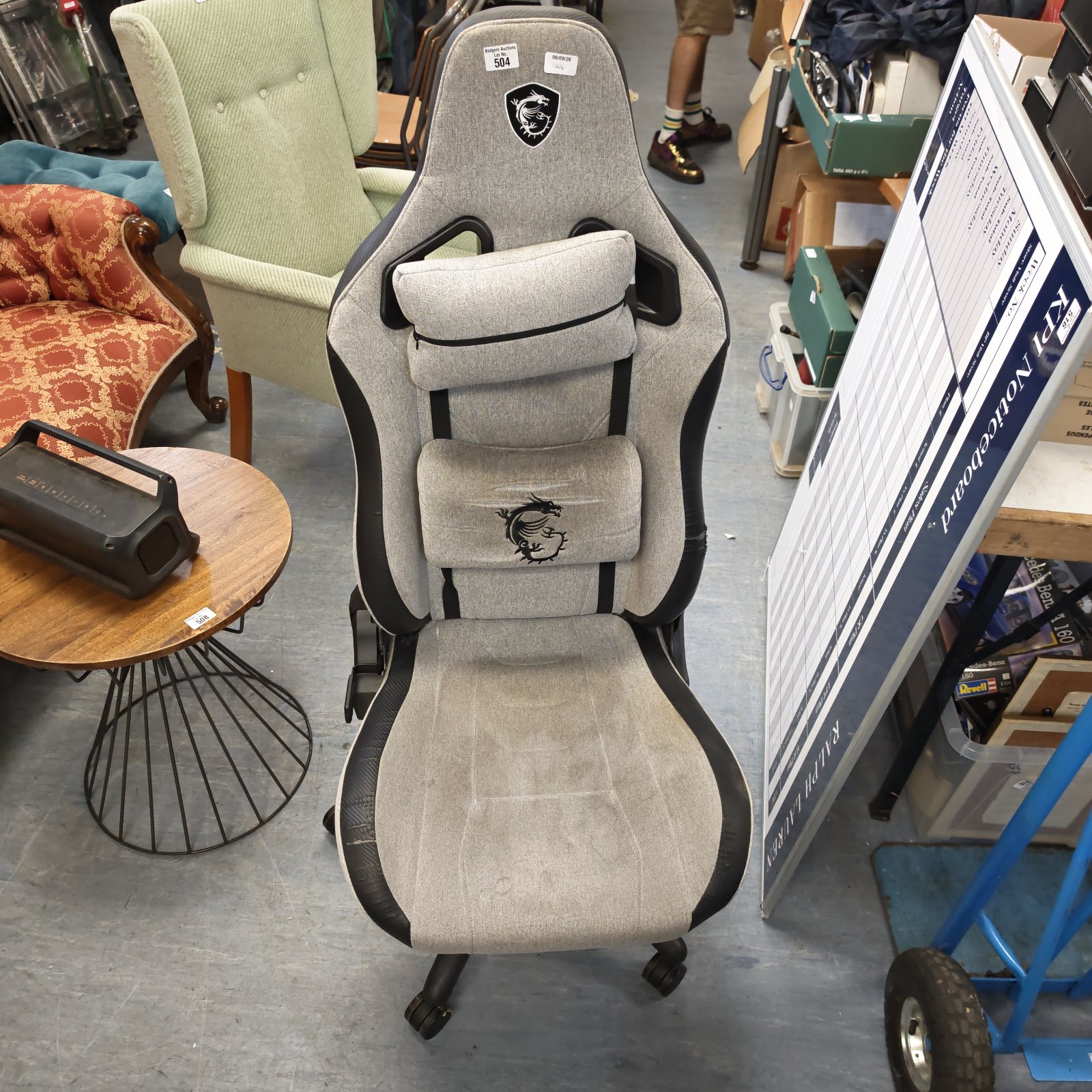Grey and black MSI MAG gaming chair with high backrest.