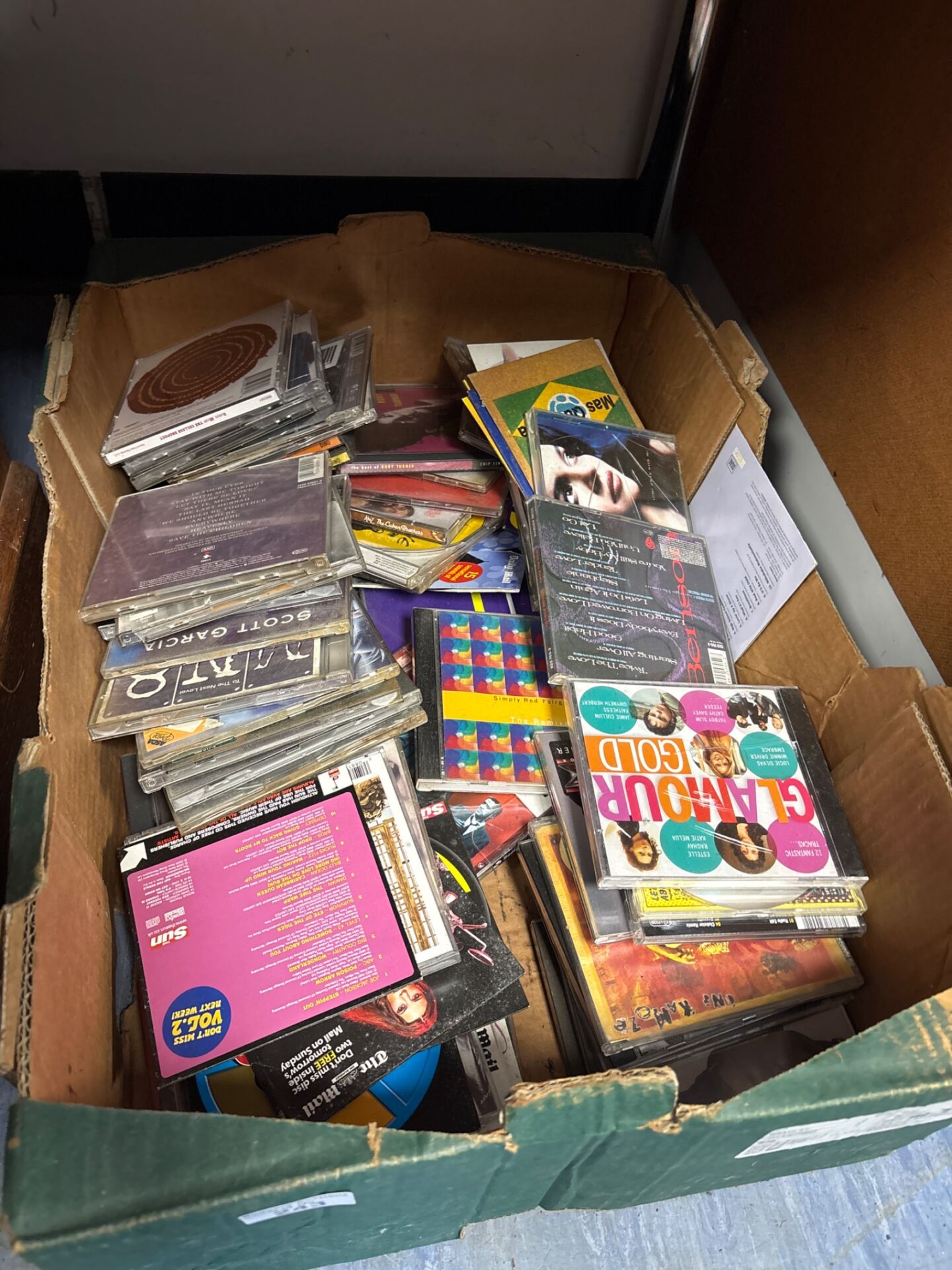 243 Box of mixed music CDs