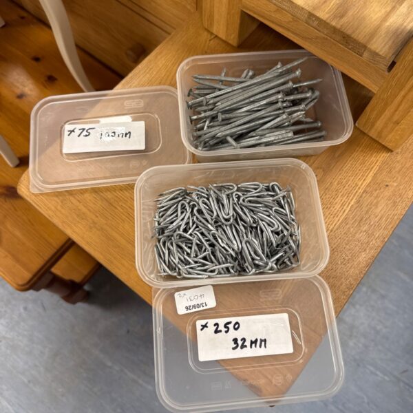 Lot of nails and staples for DIY projects and repairs.