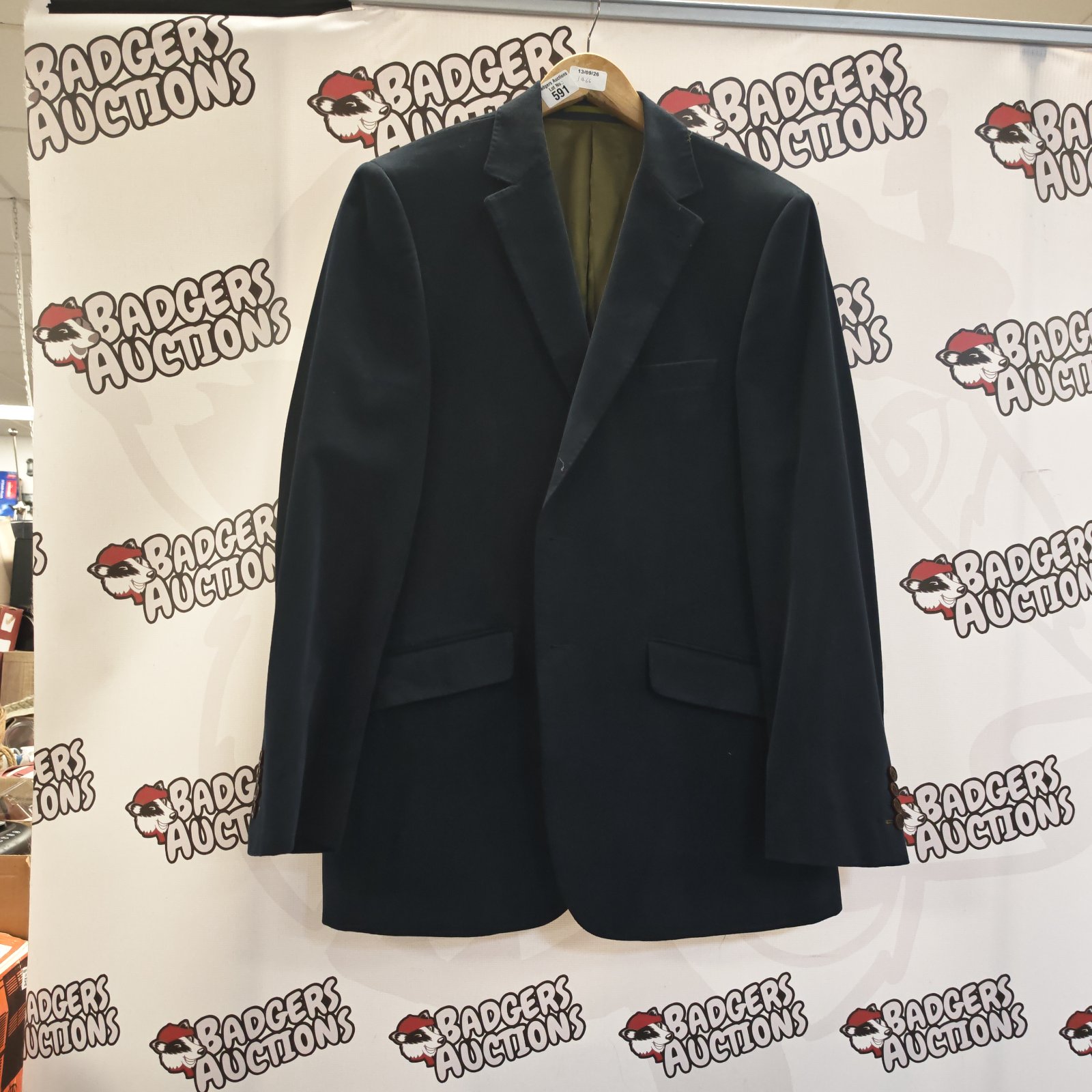 Navy blue dinner jacket size 52 for formal occasions.