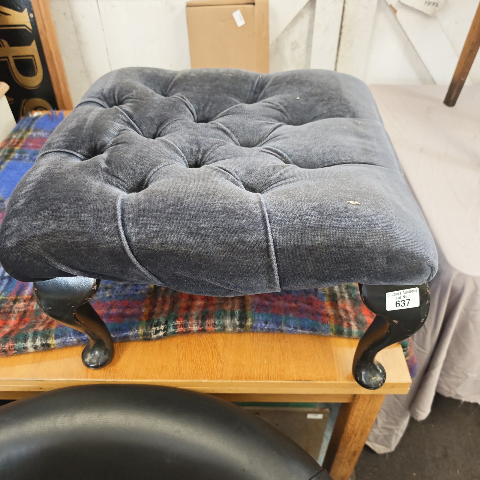 Navy blue footstool with turned legs, vintage home decor.