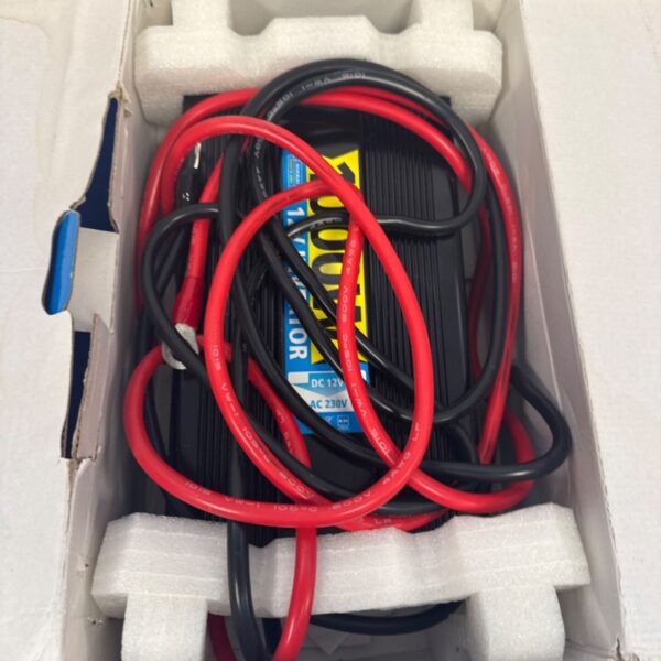 Nikkai 1000W power inverter with red and black cables.
