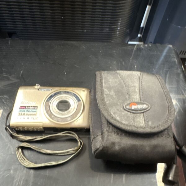 Nikon Coolpix S2500 digital camera in protective case.