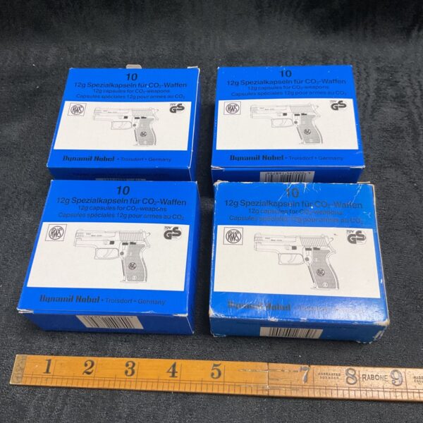Vintage boxes of 12g Nobel CO2 capsules for airguns and bicycles.