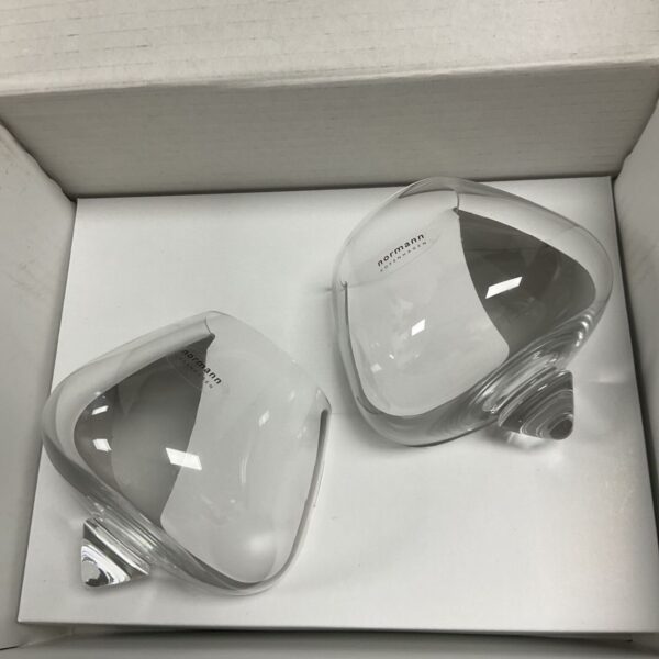 Boxed pair of Normann Copenhagen Cognac Kugle glasses, showcasing modern design.