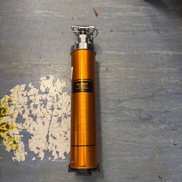 Vintage red Nu-Swift model 80 automatic fire extinguisher.