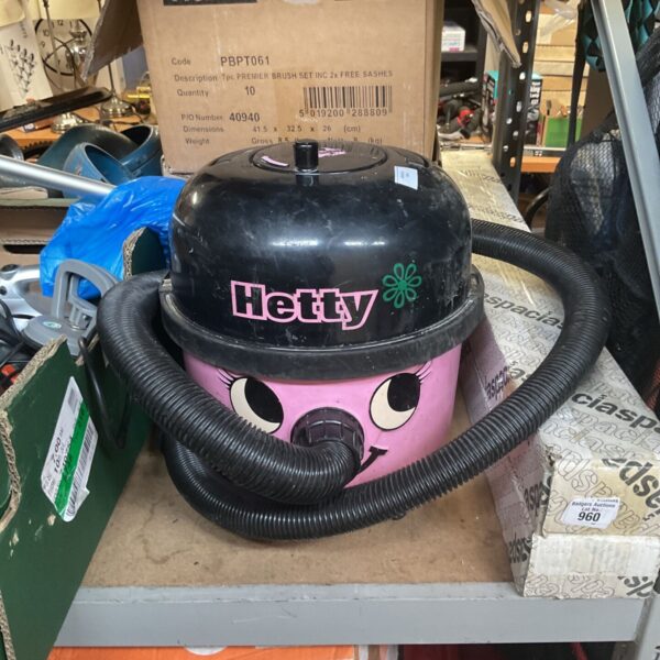 Pink Numatic Hetty cylinder vacuum cleaner, vintage domestic appliance.