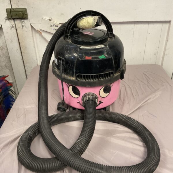 Vintage Numatic Hetty cylinder vacuum cleaner with hose.