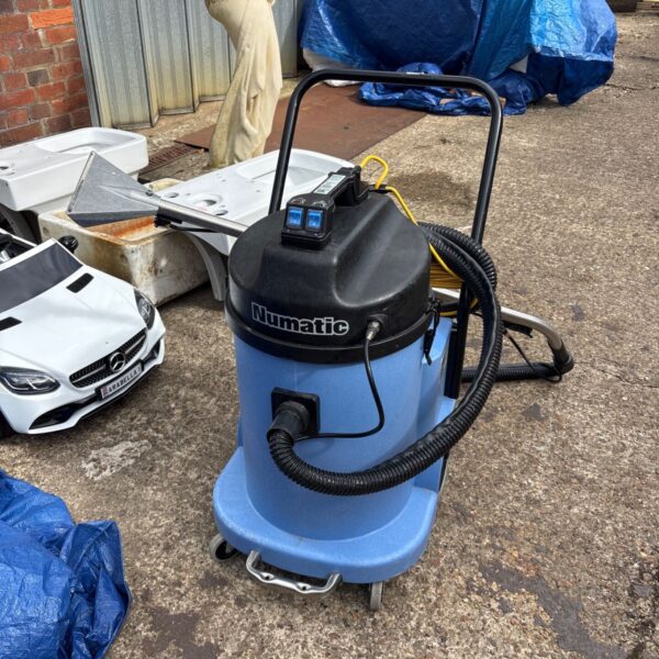 Numatic WV470 commercial wet and dry vacuum cleaner in used condition.