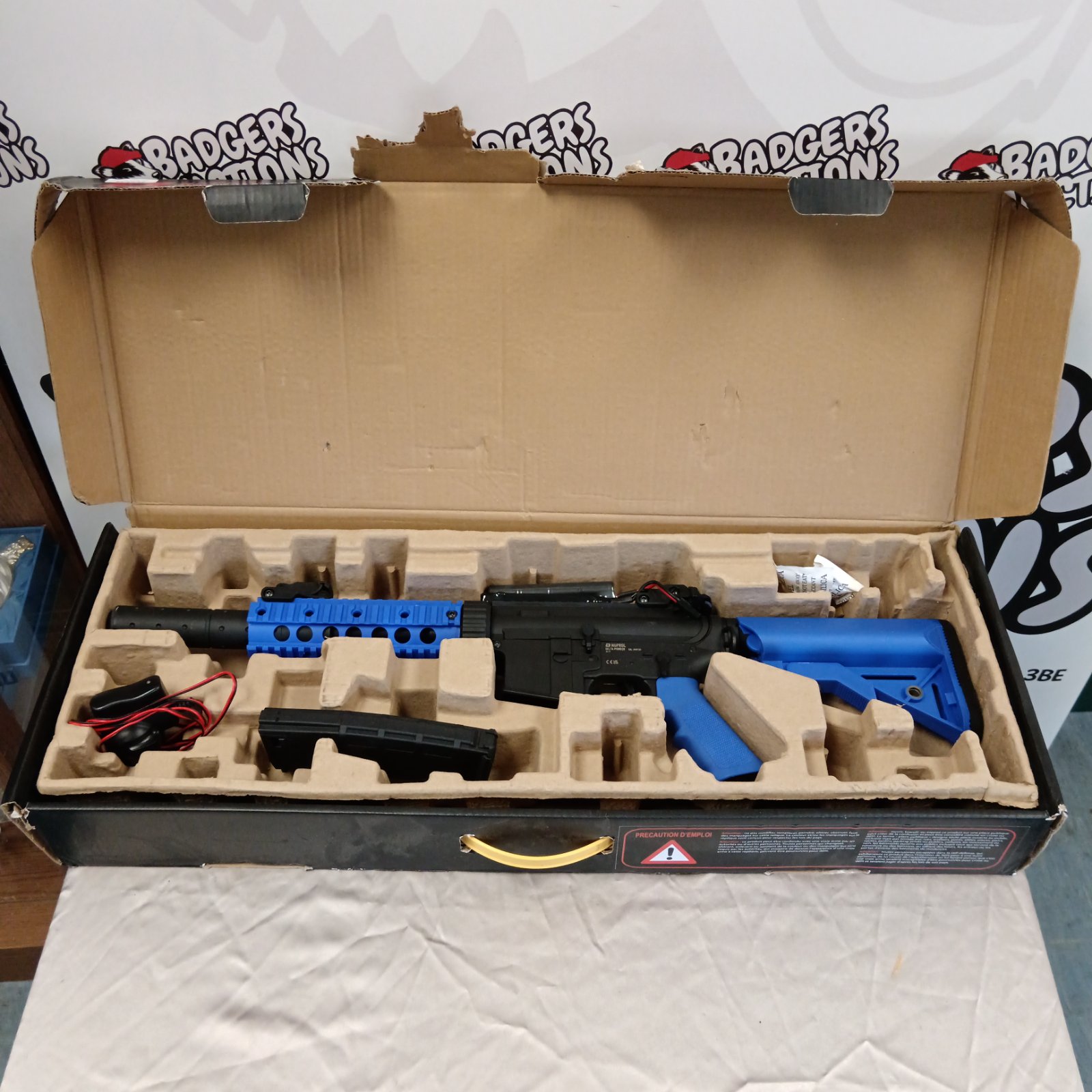 Nuprol Delta Pioneer airsoft rifle inside its original packaging.