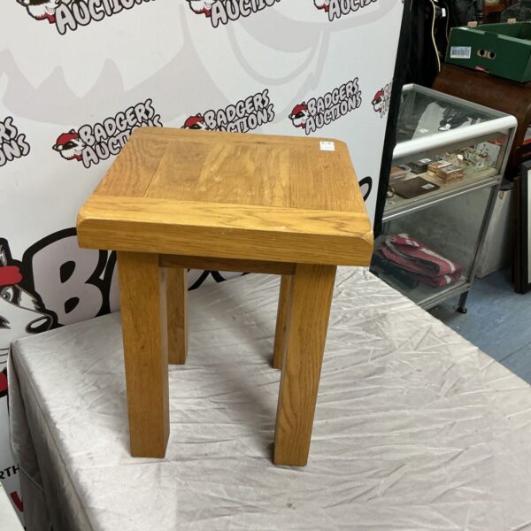 Vintage oak side table with a country style.